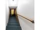 Stairwell leads to a basement area, offering additional living space for recreation or storage at 3560 Emily Way, Atlanta, GA 30349