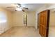 Bright bedroom featuring ceiling fan and an ensuite bathroom perfect for unwinding after a long day at 3560 Emily Way, Atlanta, GA 30349