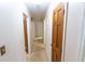 Hallway features neutral walls and carpet, providing access to various rooms at 3560 Emily Way, Atlanta, GA 30349