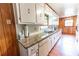 Functional kitchen with granite countertops and lots of cabinet storage space at 3560 Emily Way, Atlanta, GA 30349