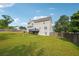 Spacious backyard with lush grass, mature trees, and a well-manicured lawn at 3715 Frankie Wade Ln, Loganville, GA 30052