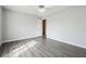 Bedroom featuring grey luxury vinyl plank flooring and a ceiling fan at 3715 Frankie Wade Ln, Loganville, GA 30052