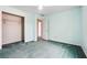 Bedroom with walk-in closet and neutral walls, carpeted floor and ceiling fan at 3715 Frankie Wade Ln, Loganville, GA 30052