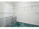 Walk-in closet with built-in wire shelving and a separate wire storage cube for organization at 3715 Frankie Wade Ln, Loganville, GA 30052