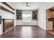 Dining area featuring hardwood floors and custom wall decor with access to the kitchen at 3715 Frankie Wade Ln, Loganville, GA 30052
