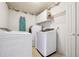A well-equipped laundry room with modern machines, ample storage, and functional design at 3715 Frankie Wade Ln, Loganville, GA 30052