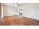 Spacious living room with sleek hardwood floors and lots of natural light at 3715 Frankie Wade Ln, Loganville, GA 30052