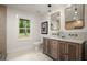 Elegant bathroom with double vanity, modern fixtures, and a serene atmosphere at 140 Larose Se Cir, Marietta, GA 30060