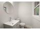 Stylish powder room with modern vanity, fixtures and neutral color scheme at 140 Larose Se Cir, Marietta, GA 30060