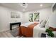 Bright bedroom features a comfortable bed, modern decor, and ample lighting at 140 Larose Se Cir, Marietta, GA 30060