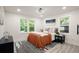 Bright bedroom features a large window, neutral tones, and a comfortable bed at 140 Larose Se Cir, Marietta, GA 30060