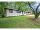 Beautifully landscaped home featuring modern exterior, and a spacious driveway at 140 Larose Se Cir, Marietta, GA 30060