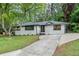 Beautifully landscaped home featuring modern exterior, and a spacious driveway at 140 Larose Se Cir, Marietta, GA 30060
