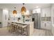 Bright kitchen showcasing an island with seating, stainless steel appliances, and ample cabinet space at 140 Larose Se Cir, Marietta, GA 30060