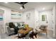 Cozy living room features a ceiling fan, comfortable seating, and stylish decor at 140 Larose Se Cir, Marietta, GA 30060