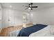 Bright bedroom with hardwood floors and an ensuite bathroom entrance at 1863 Trumbull Dr, Atlanta, GA 30338
