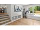 Spacious bonus room with hardwood floors, built-in shelving, and natural light, perfect for relaxation at 1863 Trumbull Dr, Atlanta, GA 30338