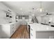 Spacious kitchen with a large island, hardwood floors, and stainless steel appliances at 1863 Trumbull Dr, Atlanta, GA 30338