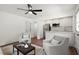 Open-concept living room and kitchen with modern finishes and ample seating at 1863 Trumbull Dr, Atlanta, GA 30338