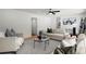 Bright living room featuring neutral tones, modern decor, and a ceiling fan at 1863 Trumbull Dr, Atlanta, GA 30338