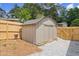 Backyard shed with privacy fence, providing convenient storage space at 1863 Trumbull Dr, Atlanta, GA 30338
