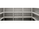 Walk-in closet with rows of empty shelves at 1863 Trumbull Dr, Atlanta, GA 30338