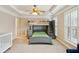 Bright bedroom showcasing a bunk bed, ceiling fan and natural light from shuttered windows at 4888 Colchester Se Ct # 3, Atlanta, GA 30080