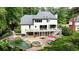 Spacious backyard featuring a custom pool with a spa, a patio, and a multi-level deck at 520 Flying Scot Way, Alpharetta, GA 30005