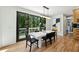 Bright dining room with sliding glass doors leading to an outdoor space at 520 Flying Scot Way, Alpharetta, GA 30005