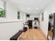 Bright home gym with natural light, mirrored wall, and equipment including a bench and treadmill at 520 Flying Scot Way, Alpharetta, GA 30005