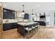 Stylish kitchen featuring an island with seating, custom cabinets, and stainless appliances at 520 Flying Scot Way, Alpharetta, GA 30005