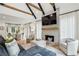 Bright and airy living room showcasing a fireplace, neutral colors, and hardwood floors at 520 Flying Scot Way, Alpharetta, GA 30005