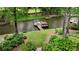 Beautiful waterfront property with boat dock and meticulously maintained landscaping at 520 Flying Scot Way, Alpharetta, GA 30005