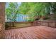 Spacious wood deck with wood railing overlooking the backyard at 2360 Elon Way, Decatur, GA 30033
