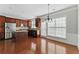Well-lit kitchen featuring an island, stainless steel appliances, and outdoor access at 2313 Millhaven St, Smyrna, GA 30080
