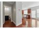 Eat-in kitchen next to powder room featuring an island and stainless appliances at 2313 Millhaven St, Smyrna, GA 30080