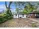 Cozy backyard with a mix of hardscape and natural elements, perfect for outdoor enjoyment at 554 Lawton Sw St, Atlanta, GA 30310
