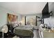 Calm bedroom featuring a large window, modern decor, and comfortable bedding at 133 Maison Nw Pl, Atlanta, GA 30327