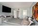 Bedroom featuring light blue walls, mounted television, and modern decor at 133 Maison Nw Pl, Atlanta, GA 30327