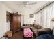 Cozy living room featuring a ceiling fan, brick-tile floor and an L-shaped couch at 133 Maison Nw Pl, Atlanta, GA 30327