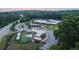 Aerial view of community playground and school with a park at 173 Basil St, Cumming, GA 30040