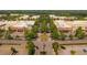 An aerial view of a shopping complex lined with trees and parking spaces at 173 Basil St, Cumming, GA 30040