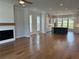 Open-concept living area, showcasing a modern kitchen with a central island at 173 Basil St, Cumming, GA 30040