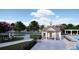 Club house with pool and lounge area with colorful foliage at 173 Basil St, Cumming, GA 30040