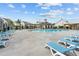 Community pool featuring ample lounge seating and a covered cabana area for residents at 173 Basil St, Cumming, GA 30040