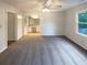 Spacious bedroom with new carpet and a view into the vanity/bathroom area at 2067 Wellborn Close, Lithonia, GA 30058