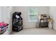 Bedroom with plenty of room, including an arcade game and stackable plastic bins at 4925 Longview Walk, Decatur, GA 30035