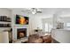 Bright living space features a fireplace, hardwood floors, and open concept living at 4925 Longview Walk, Decatur, GA 30035