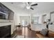 Bright living space features a fireplace, hardwood floors, and open concept living at 4925 Longview Walk, Decatur, GA 30035