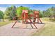 A colorful playground set promises hours of fun and adventure in a safe, Gathering-friendly backyard environment at 2410 Emerald Dr, Loganville, GA 30052